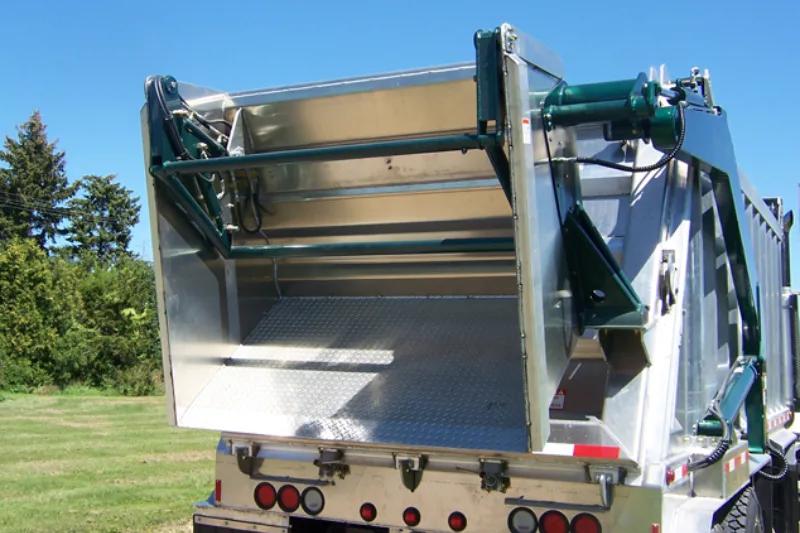 Pair of gas springs supporting a raised hatch