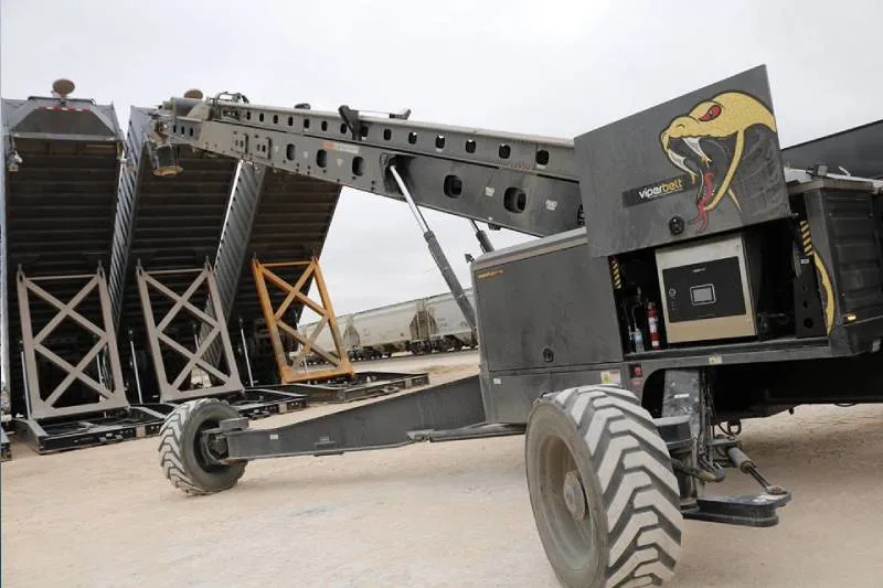 Gas spring installed on a heavy equipment access panel